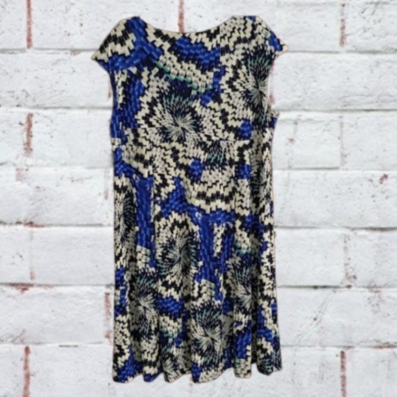 NOT AVAILABLE. Glamour surplice flowy mini dress, bright blue pattern NWT - Picture 3 of 11